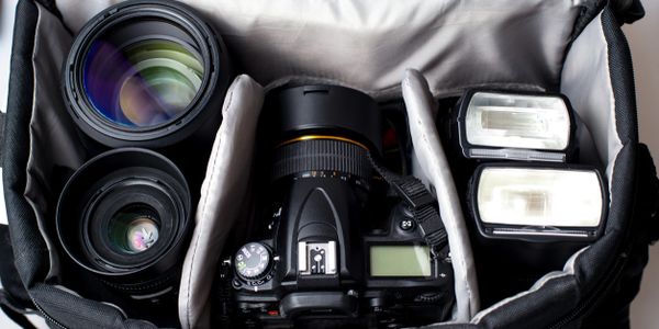 a photography camera in the bag.